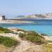 Spiaggia della Pelosa di Stintino  Una delle spiagge pi famose di tutta la Sardegna, situata allestremit a nord-ovest dellisola. E caratterizzata da sabbia bianchissima e acque cristalline circondate da macchia mediterranea. Prende il suo nome dall'isolotto della Pelosa, raggiungibile a piedi attraversando una vicina caletta